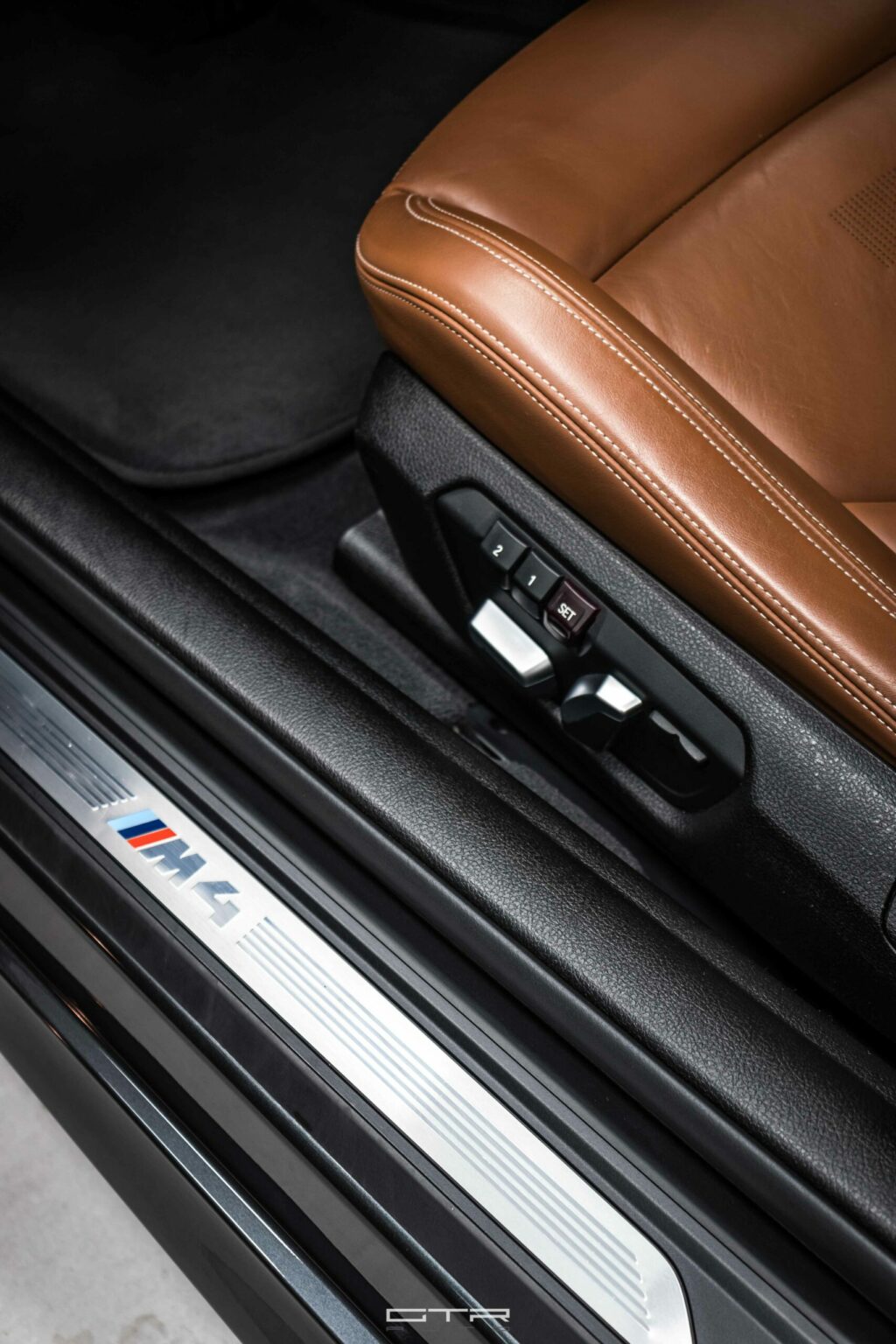 alt = "bmw m4 competition interior"