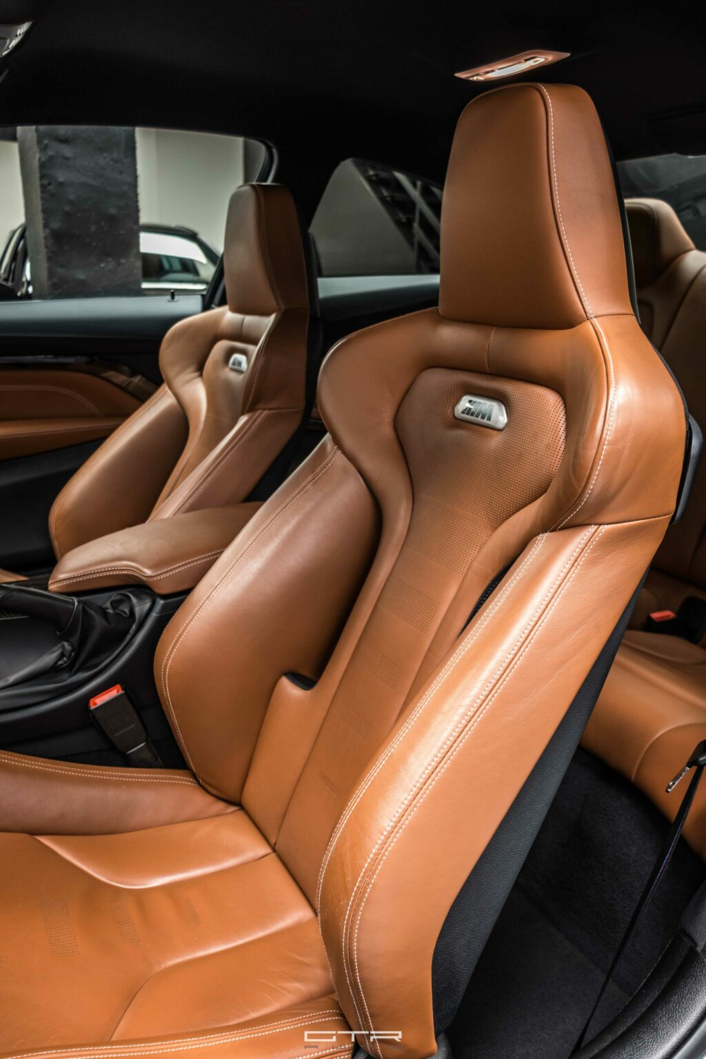 alt = "bmw m4 competition interior"
