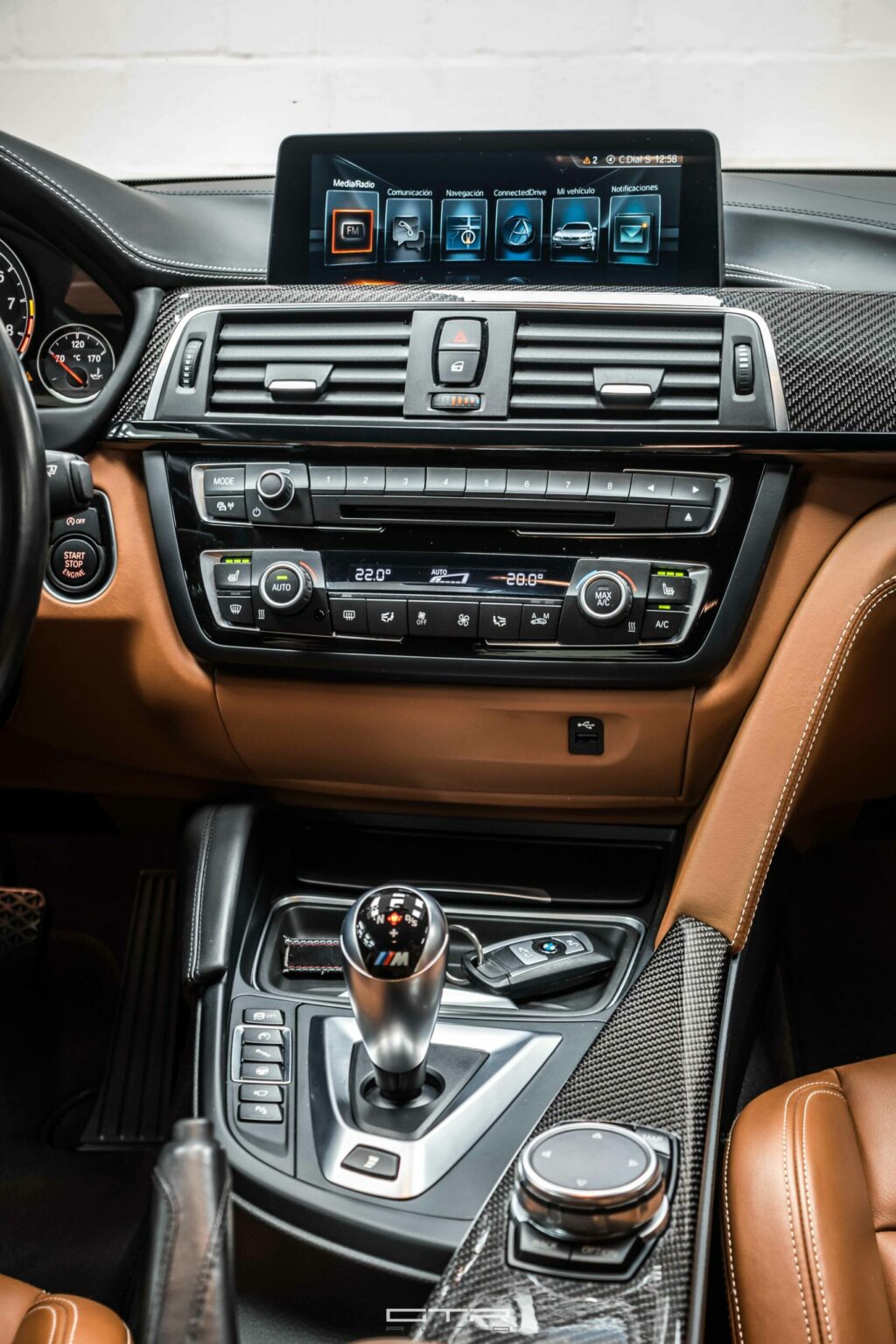alt = "bmw m4 competition interior"