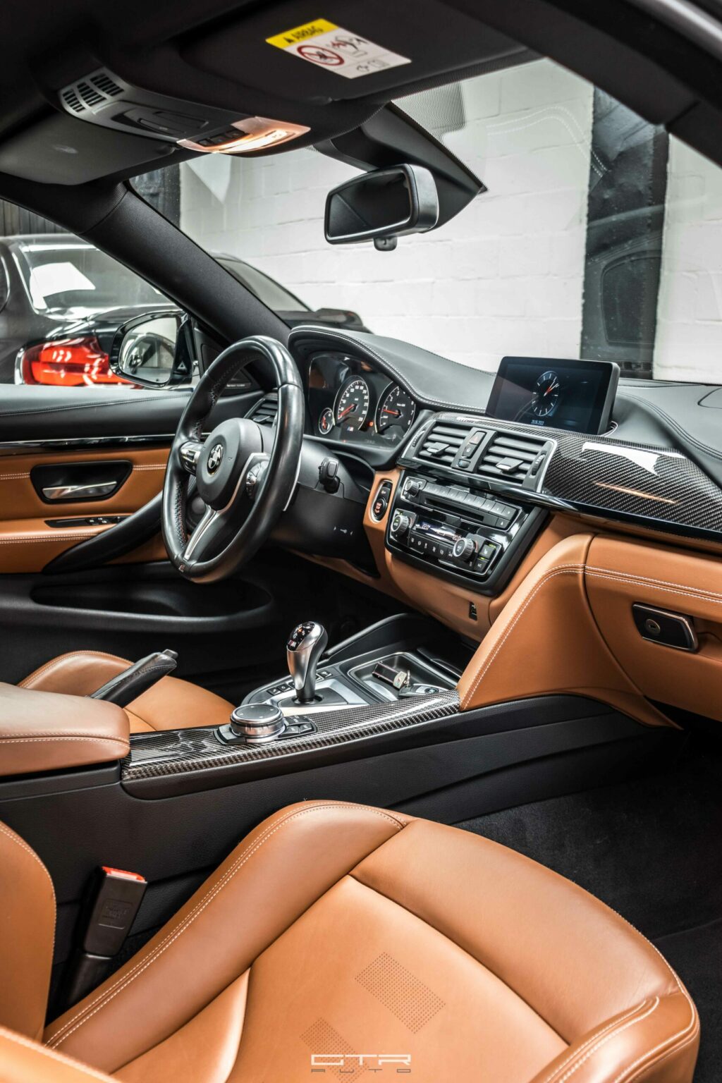 alt = "bmw m4 competition interior"